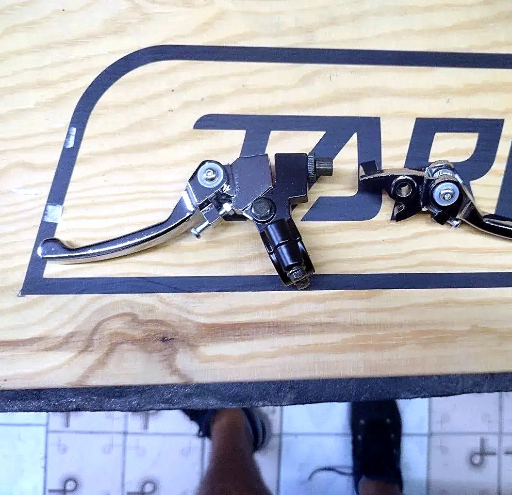 Brake and clutch pedal lever set for multiple engine types
