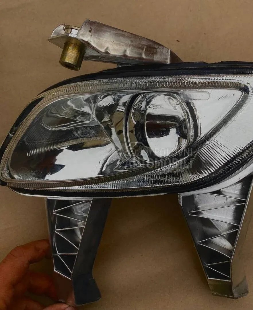 Fog light left Lancia Musa 2003-2011