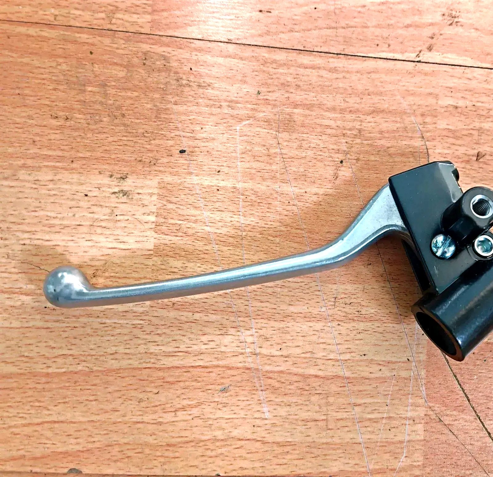 Vespa LX rear left brake lever bracket and left mirror bracket